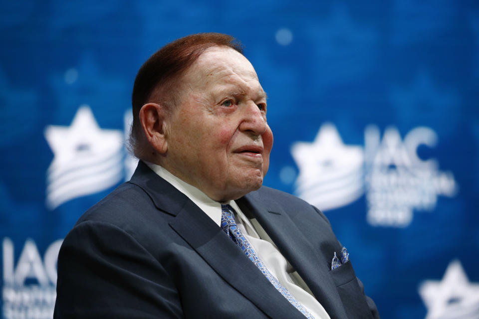 FILE - In this Dec. 7, 2019, file photo, Las Vegas Sands Corporation Chief Executive Sheldon Adelson sits onstage before President Donald Trump speaks at the Israeli American Council National Summit in Hollywood, Fla. One of the most influential Republican megadonors, Adelson, died Jan. 11, 2021. That puts more pressure on the NRSC and the leading Senate Republican outside group, Senate Leadership Fund, to cover the difference. (AP Photo/Patrick Semansky, File)