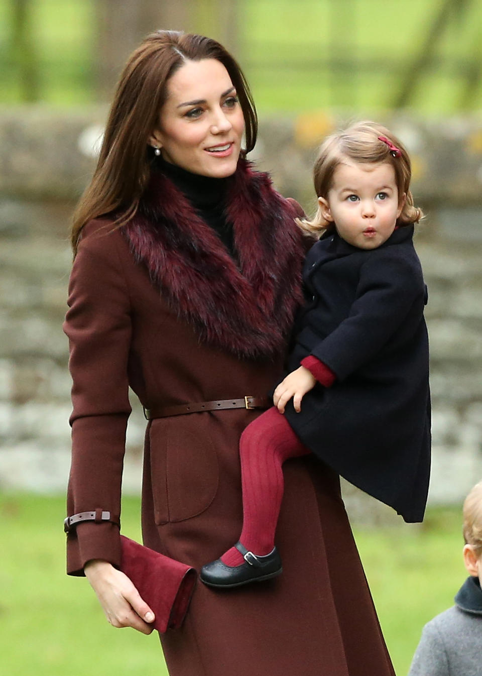 BUCKLEBURY, BERKSHIRE - DECEMBER 25:  Catherine, Duchess of Cambridge and  Princess Charlotte of Cambridge attend Church on Christmas Day on December 25, 2016 in Bucklebury, Berkshire.  (Photo by Danny Martindale/WireImage)