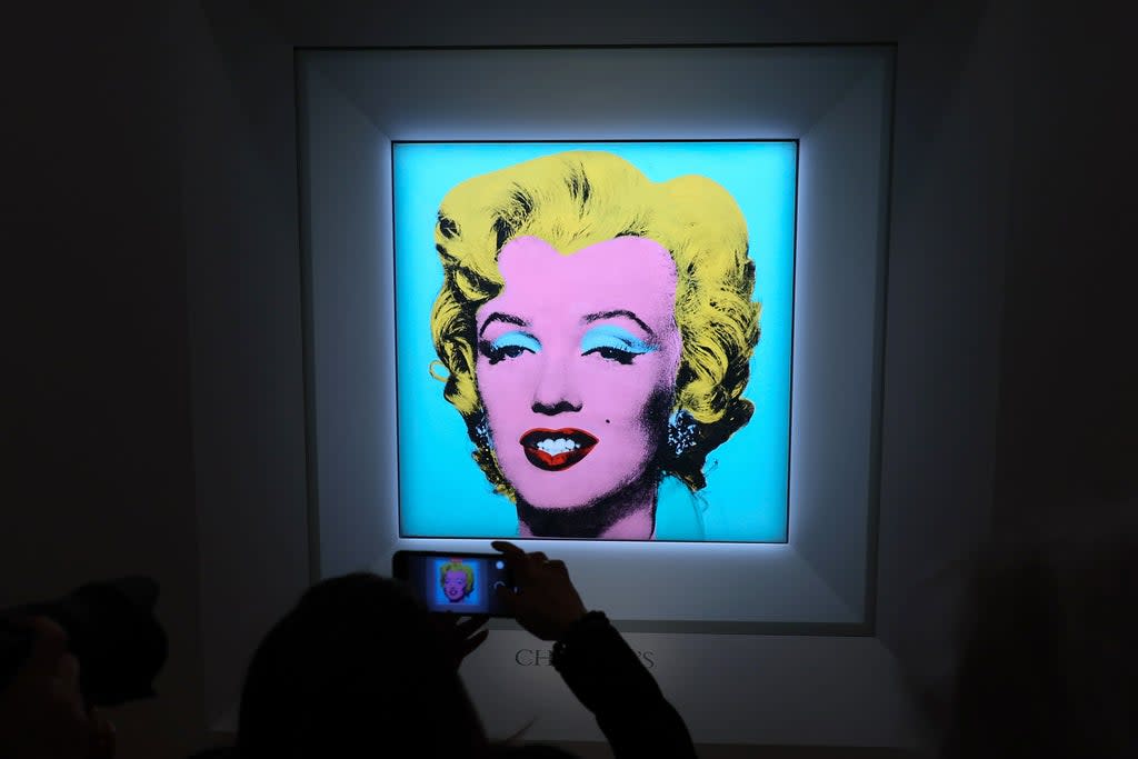Warhol’s iconic portrait ‘Shot Sage Blue Marilyn’, which is due to go on sale at Christie’s in May (Getty)