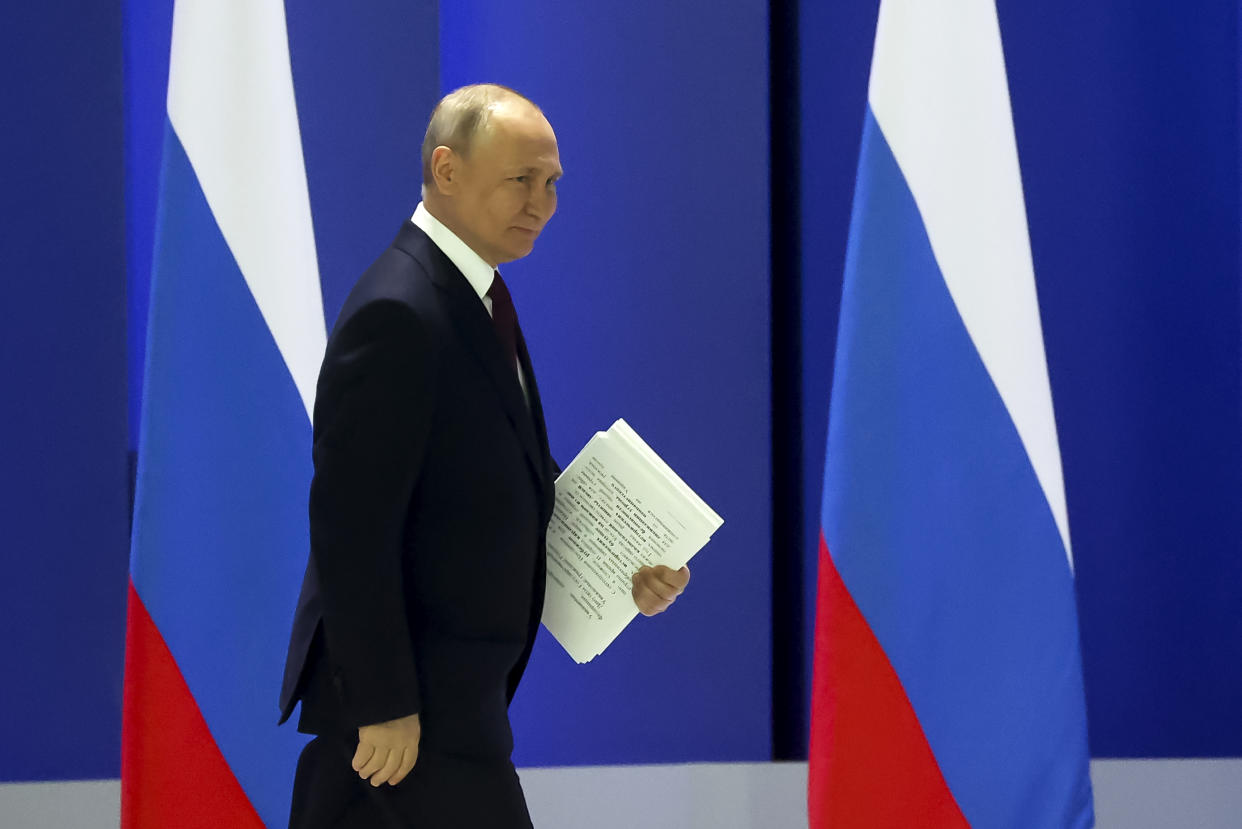 Russian President Vladimir Putin arrives to give his annual state of the nation address in Moscow, Russia, Tuesday, Feb. 21, 2023. (Sergei Karpukhin, Sputnik, Kremlin Pool Photo via AP)