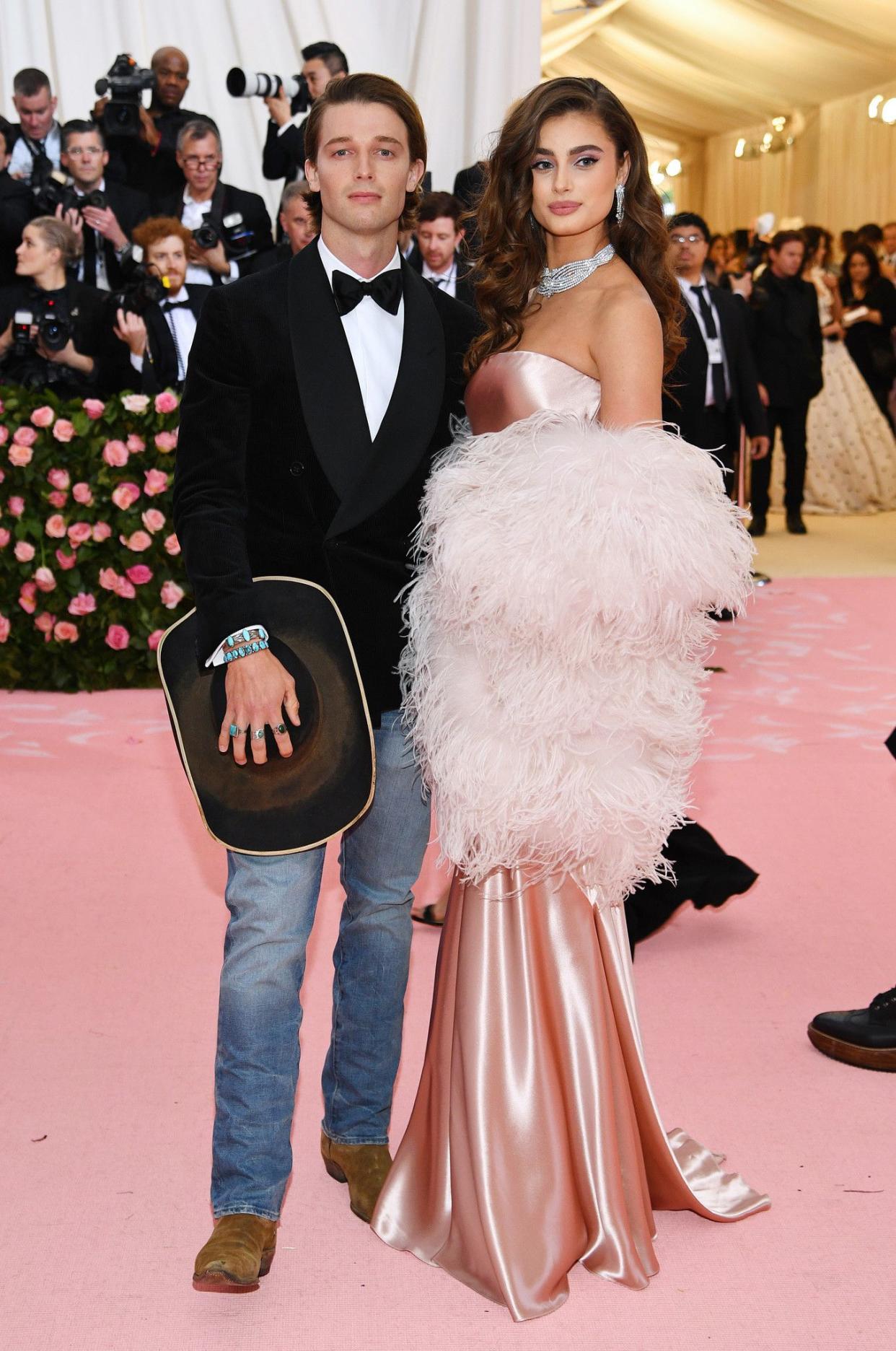 Patrick Schwarzenegger and Taylor Hill attend The 2019 Met Gala Celebrating Camp: Notes on Fashion at Metropolitan Museum of Art on May 06, 2019 in New York City.