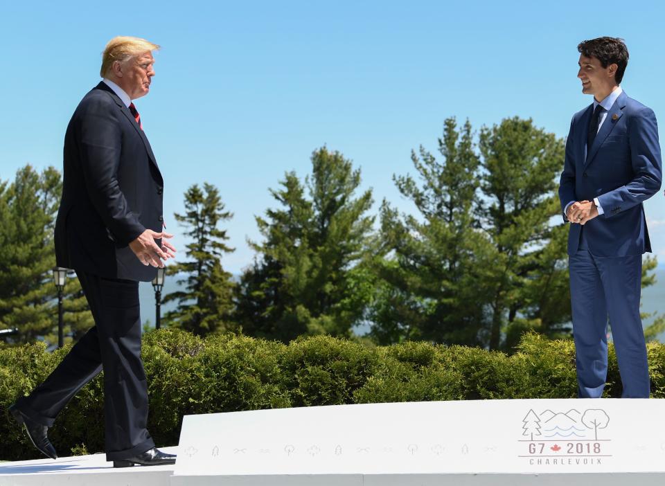 <p>President Donald Trump (L) is greeted by Canadian Prime Minister Justin Trudeau during the G7 Summit in La Malbaie, Quebec, Canada, June 8, 2018. (Photo: Saul Loeb/AFP/Getty Images) </p>