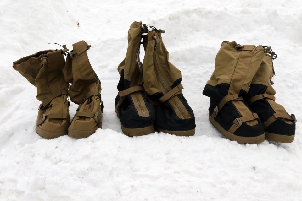 Three models of over boots were distributed to 10th Mountain Division soldiers during a prototype winter gear issue, Jan 23, 2020, on Fort Drum, New York. (Pfc. Anastasia Rakowsky/Army)