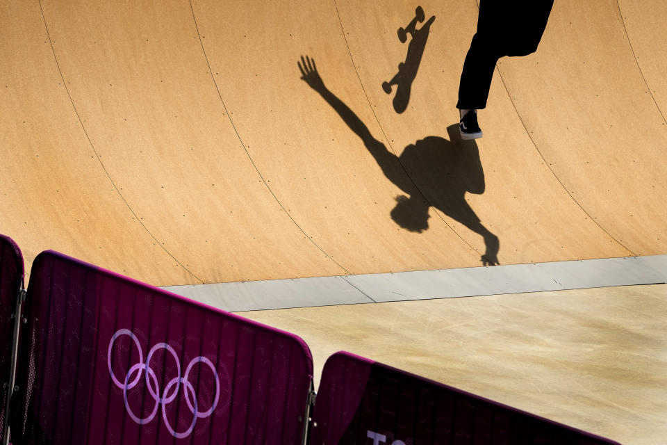 An athlete from Belgium practices for the skateboarding competition at the 2020 Summer Olympics, Tuesday, July 20, 2021, at the Ariake Urban Sports Park in Tokyo. (AP Photo/Charlie Riedel)