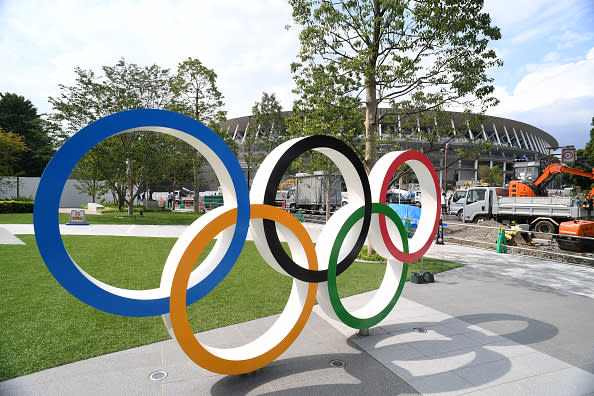 The Olympic Rings are displayed in front of the New National Stadium, where construction continues on the day marking one year to go until the 2020 Olympic Games in Tokyo, Japan, on July 24, 2019.<span class="copyright">Etsuo Hara—Getty Images</span>