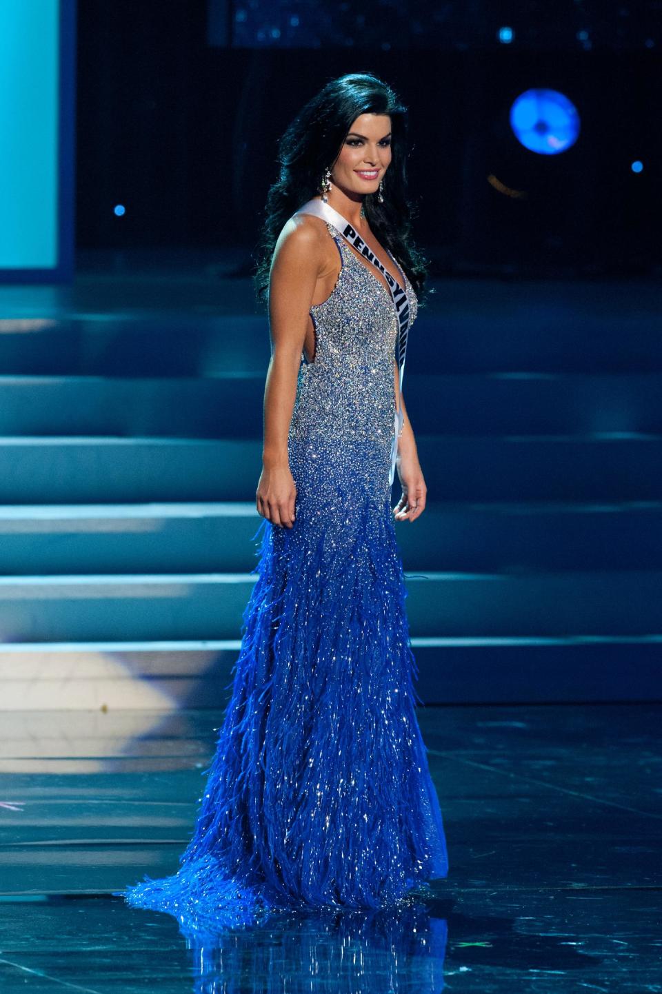 In this photo provided by the Miss Universe Organization, Miss Pennsylvania Sheena Monnin competes during the 2012 Miss USA Presentation Show on Wednesday, May 30, 2012 in Las Vegas. Monnin resigned her crown claiming the contest is rigged, but according to organizers the beauty queen was upset over the decision to allow transgender contestants to enter. A posting on Monnin’s Facebook page claims another contestant learned the names of the top 5 finishers on Sunday morning, hours before the show was broadcast. (AP Photo/Miss Universe Organization, Darren Decker)