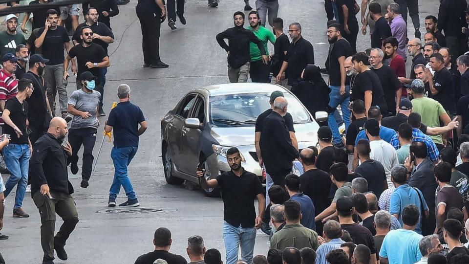 PHOTO: People react after a reported explosion occurred during the funeral of those killed when hundreds of paging devices exploded across Lebanon the previous day, in Beirut's southern suburbs on Sept. 18, 2024. (Fadel Itani/AFP via Getty Images)