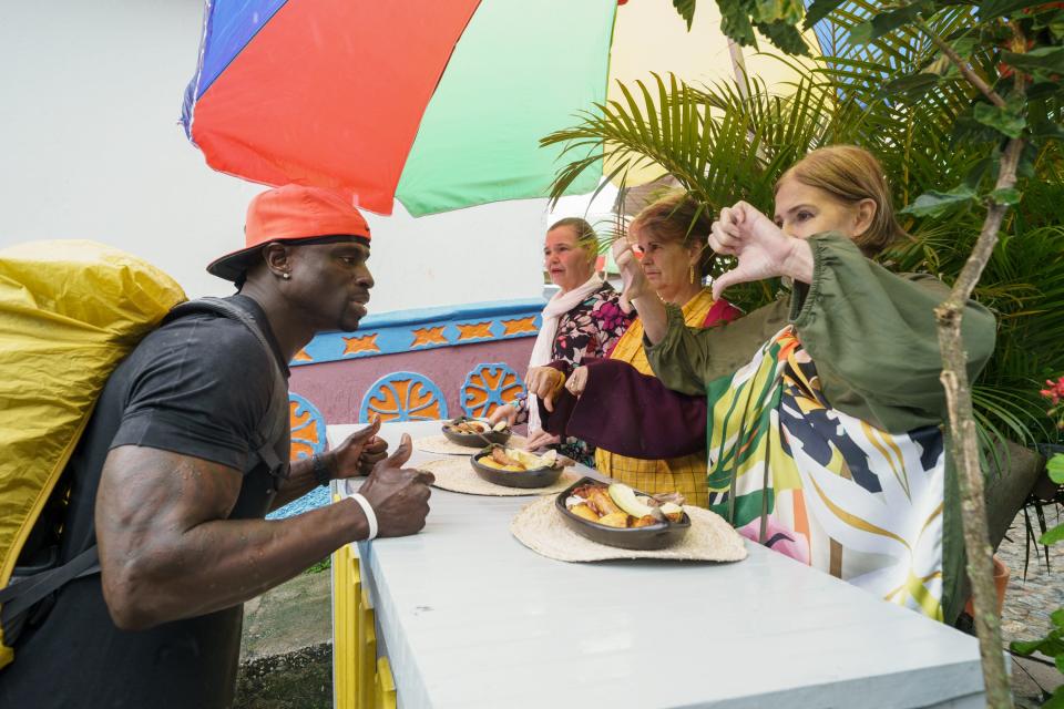 Former NFL player Rod Gardner participates in a challenge during the third episode of "The Amazing Race." The race takes teams to Colombia.