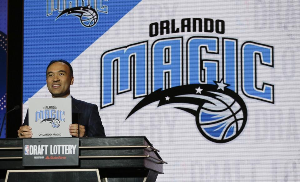 NBA Deputy Commissioner Mark Tatum announces that the Orlando Magic have the 11th pick in the 2016 NBA draft. (AP/Julie Jacobson)