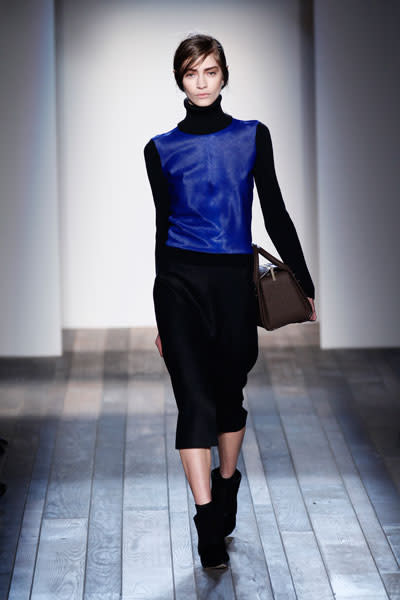 <b>Victoria Beckham AW13 at New York Fashion Week <br></b><br>Victoria decked her models out in chic, casual roll-neck jumpers with pencil skirts.<br><br>Image © Getty