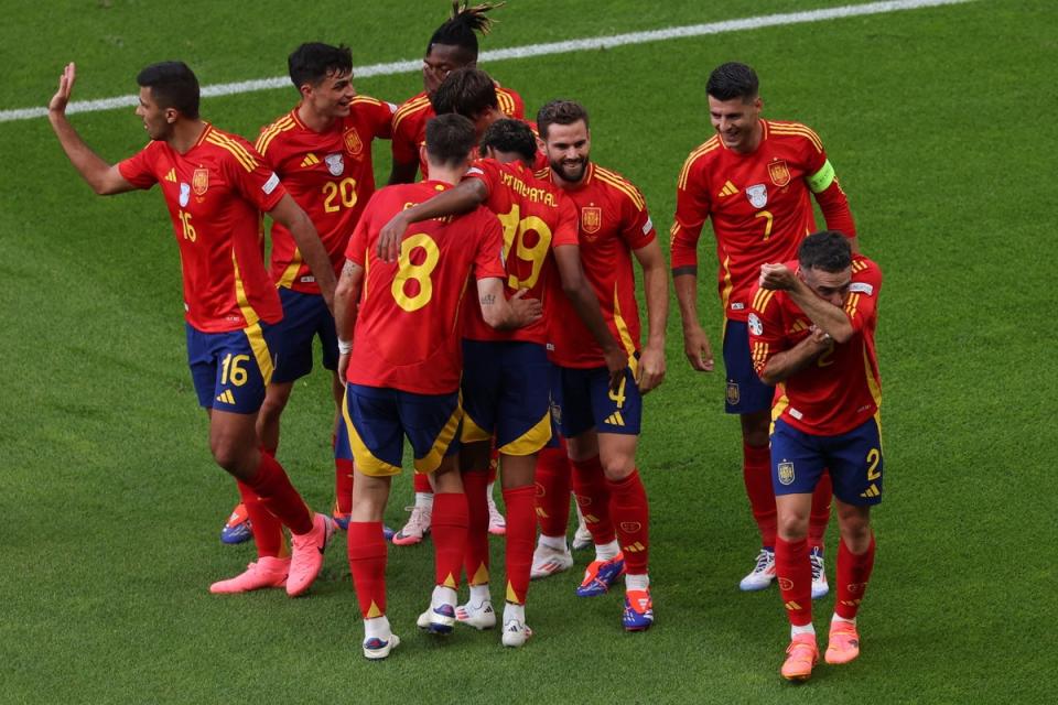 Dani Carvajal celebrates scoring for Spain (EPA)