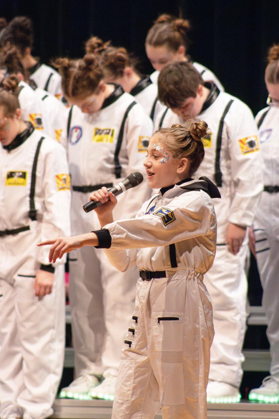 River Valley Middle School's Revolution (Caledonia) group performs Saturday during the Royal Aviation Show Choir Competition in Alliance.