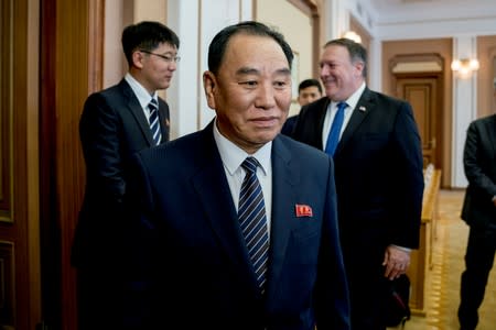 FILE PHOTO: U.S. Secretary of State Mike Pompeo and North Korean Director of the United Front Department Kim Yong Chol arrive for a meeting at the Park Hwa Guest House in Pyongyang