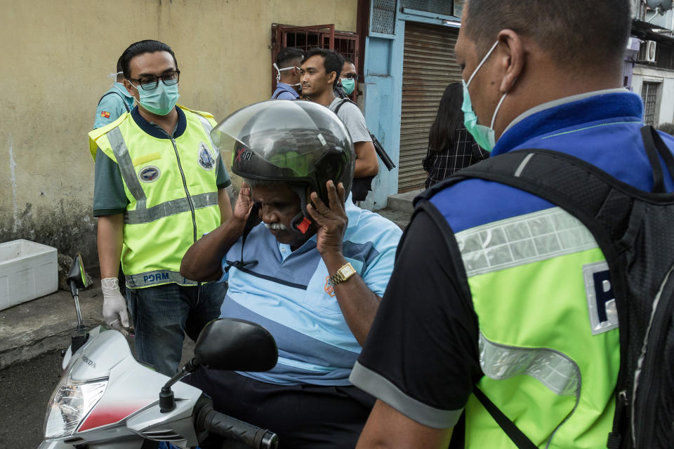 PHOTOS: Malaysian police enforce lockdown in Klang area