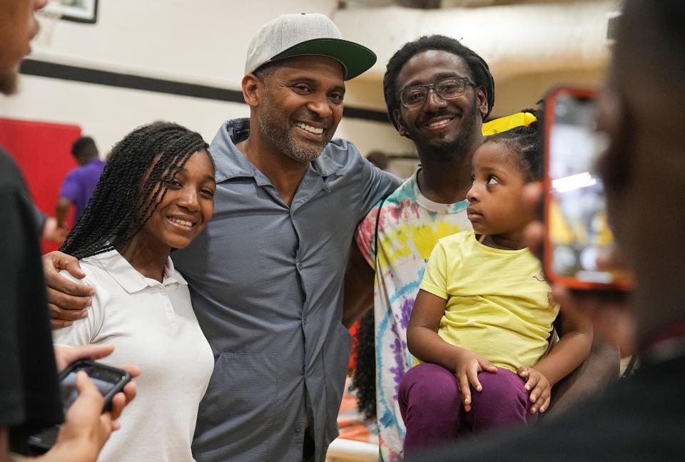 Mike Epps takes photos with fans Tuesday, Aug. 29, 2023, during the Back to School Essential Giveaway to Empower Indianapolis Students at the JTV Hill Center in Indianapolis.