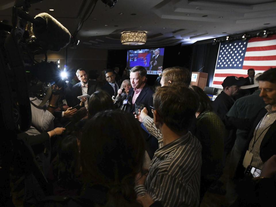 Gov. John Hickenlooper is swarmed by the media at the watch party for Colorado Democrats at the Westin Hotel in downtown Denver before the polls close Tuesday, Nov. 6, 2018. (Jerilee Bennett/The Gazette via AP)