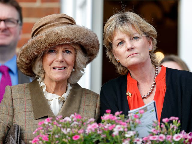 <p>Max Mumby/Indigo/Getty</p> Camilla, Duchess of Cornwall and Madeleine Lloyd Webber watch the racing as they attend the 60th Hennessy Gold Cup on November 26, 2016 in Newbury, England.