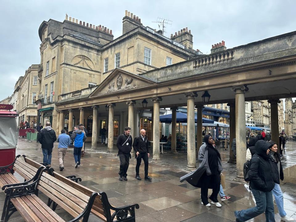 The damp weather doesn’t put tourists off Bath as visitors marvel at its many attractions (The Independent)