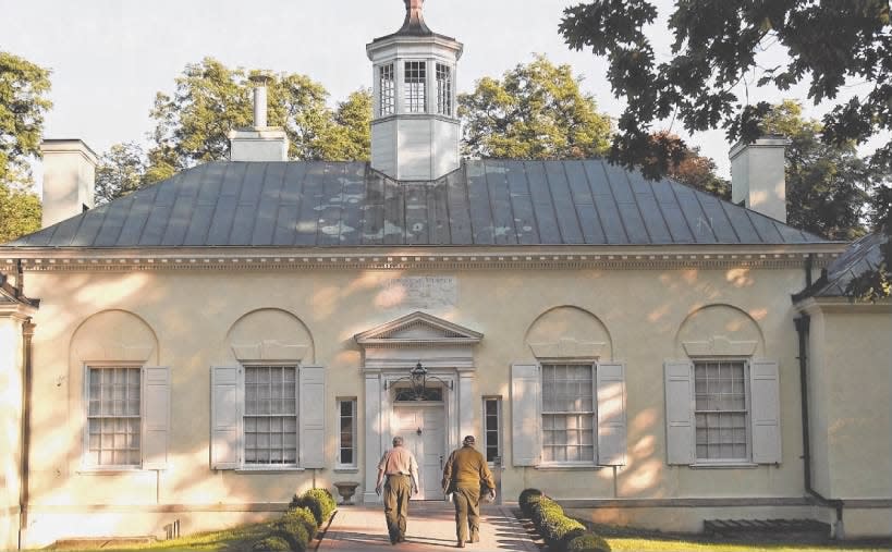 Two National Park Service rangers walk into Washington’s Headquarters Museum, which was closed, in Morristown on Tuesday, Oct. 1, 2013.