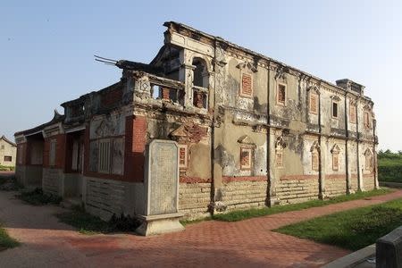 An empty military command post in the village of Guningtou with its outer walls riddled with bullet hotels is seen in Kinmen County, Taiwan, September 8, 2015. REUTERS/Pichi Chuang