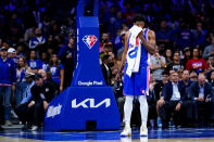 Philadelphia 76ers' Joel Embiid wipes his face during the second half of Game 6 of an NBA basketball second-round playoff series against the Miami Heat, Thursday, May 12, 2022, in Philadelphia. (AP Photo/Matt Slocum)