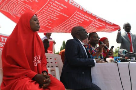 Bring Back Our Girls (BBOG) campaigners speak during a news conference on the abducted Dapchi and Chibok girls in Abuja, Nigeria March 13, 2018. REUTERS/Afolabi Sotunde