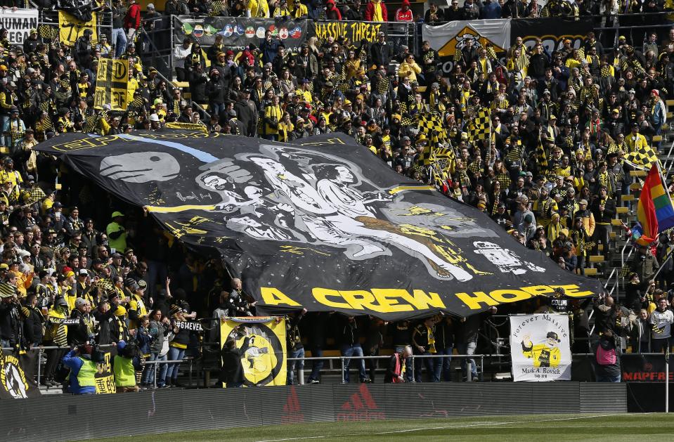 Columbus Crew SC fans in the Nordecke unveil a TIFO during the first half of the MLS match against New York City at Mapfre Stadium in Columbus on Sunday, March 1, 2020. [Adam Cairns/Dispatch] 