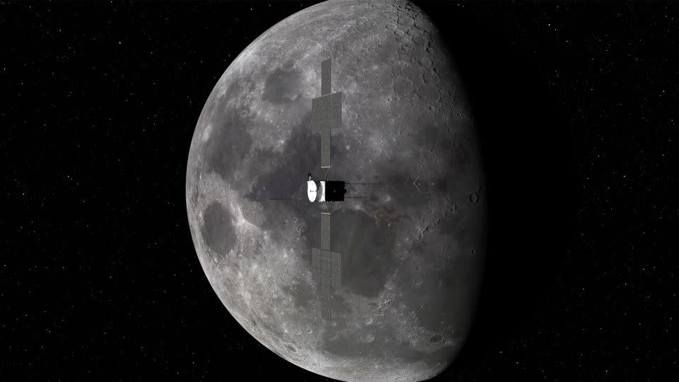 The Juice spacecraft is depicted flying by the moon in this artist's concept. - ESA