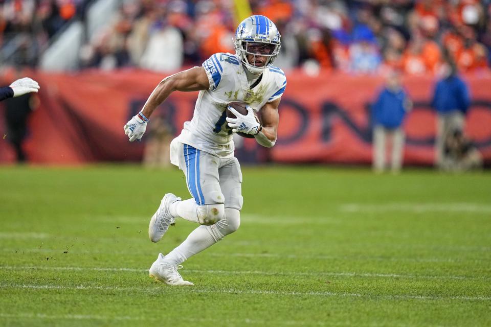 Detroit Lions wide receiver Amon-Ra St. Brown (14) 