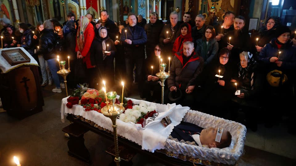 Mourners gather around the casket of Alexey Navalny during his funeral in Moscow on March 1, 2024. - Reuters