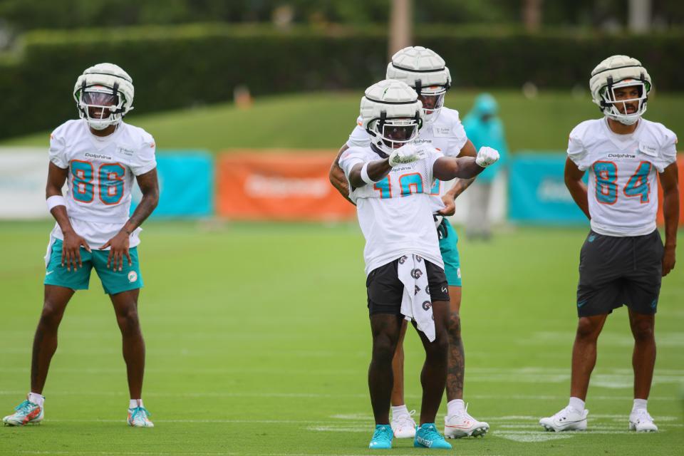 Jul 24, 2024; Miami Gardens, FL, USA; Miami Dolphins wide receiver Tyreek Hill (10) dances during training camp at Baptist Health Training Complex. Mandatory Credit: Sam Navarro-USA TODAY Sports