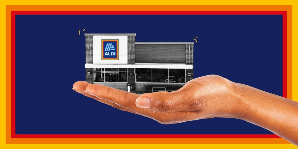 Aldi store being held in the palm of a hand, on a navy blue background with a red, orange, and yellow border