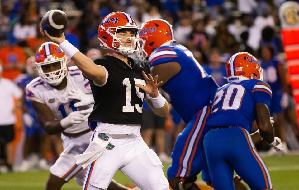 Florida Gators quarterback <a class="link " href="https://sports.yahoo.com/ncaaf/players/299744" data-i13n="sec:content-canvas;subsec:anchor_text;elm:context_link" data-ylk="slk:Graham Mertz;sec:content-canvas;subsec:anchor_text;elm:context_link;itc:0">Graham Mertz</a> (15) finds a receiver during the second half of the University of Florida Orange & Blue game at Ben Hill Griffin Stadium in Gainesville, FL on Thursday, April 13, 2023. Orange defeated Blue 10-7. [Doug Engle/Gainesville Sun]<br>Ncaa Football Orange And Blue Game