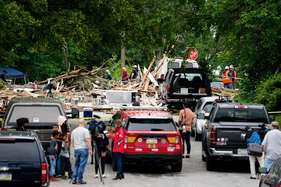 Crews work the scene of a deadly explosion in a residential neighborhood in Pottstown, Pa., Friday, May 27, 2022. (AP Photo/Matt Rourke)