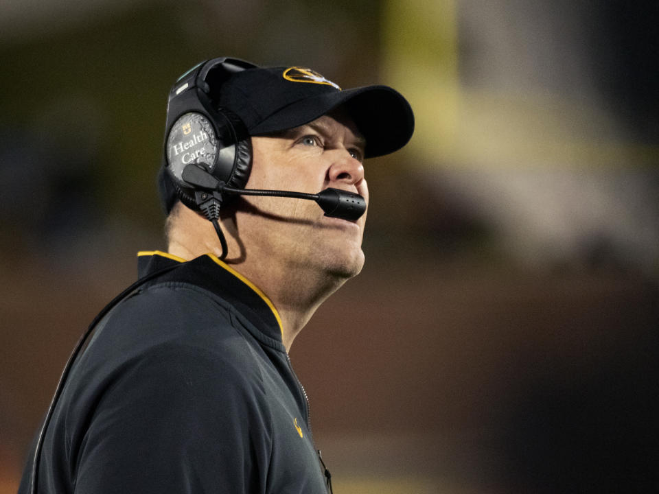 Missouri head coach Barry Odom looks at the scoreboard during the second quarter of an NCAA college football game against Tennessee, Saturday, Nov. 23, 2019, in Columbia, Mo. Tennessee won the game 24-20. (AP Photo/L.G. Patterson)