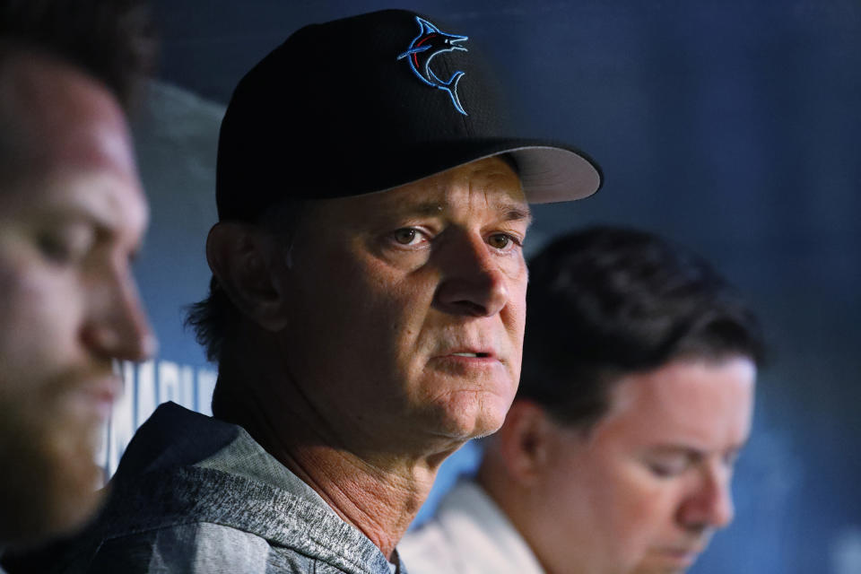 FILE - In this July 16, 2019, file photo, Miami Marlins manager Don Mattingly speaks to members of the media before the start of a baseball game against the San Diego Padres, in Miami. The Dolphins look like the worst team in the NFL, and might even be the worst team in Miami. On the other hand, a comparison with the Marlins is one matchup the Dolphins might win. (AP Photo/Wilfredo Lee, File)