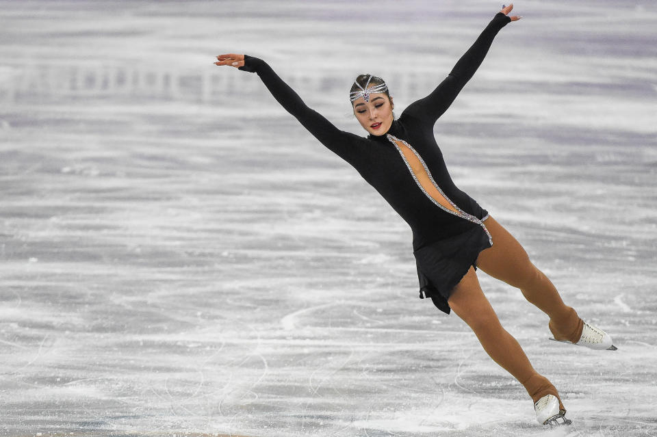 The skater representing Kazakhstan wore this striking black costume for her free skate. The full body cutout is pretty sexy, but the rest of the outfit keeps things from being too much. Her headpiece is the star of the show.