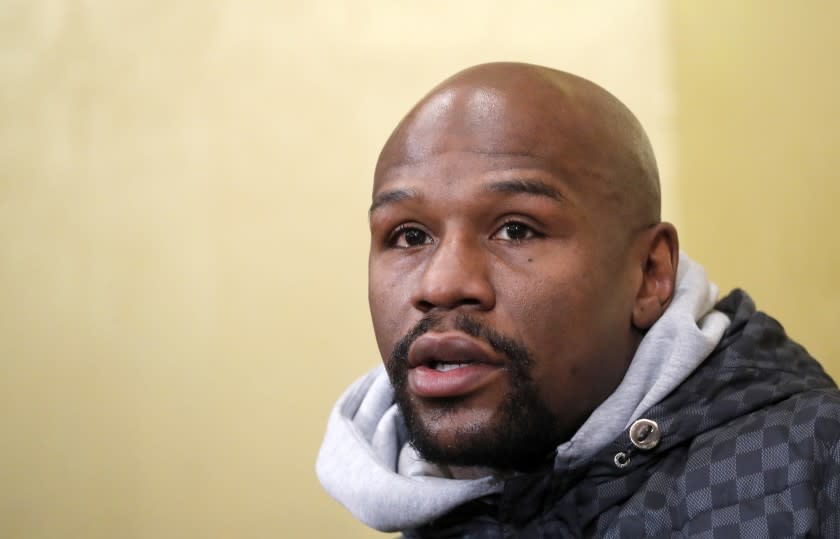 FILE - In this Dec. 29, 2018 file photo, Floyd Mayweather Jr. speaks during a news conference in Tokyo. An ex-girlfriend of boxer Floyd Mayweather Jr. who was the mother of three of his children was found dead in a Southern California suburb. Los Angeles County Sheriff Alex Villanueva tells KABC-TV Wednesday, March 11, 2020 that the coroner's office confirmed the woman was Josie Harris. She was found Tuesday night in a vehicle parked in the driveway of her apparent residence just outside the city of Santa Clarita. Fire department personnel pronounced her dead and sheriff's investigators and the coroner's office are working to determine the cause. (AP Photo/Eugene Hoshiko, File)