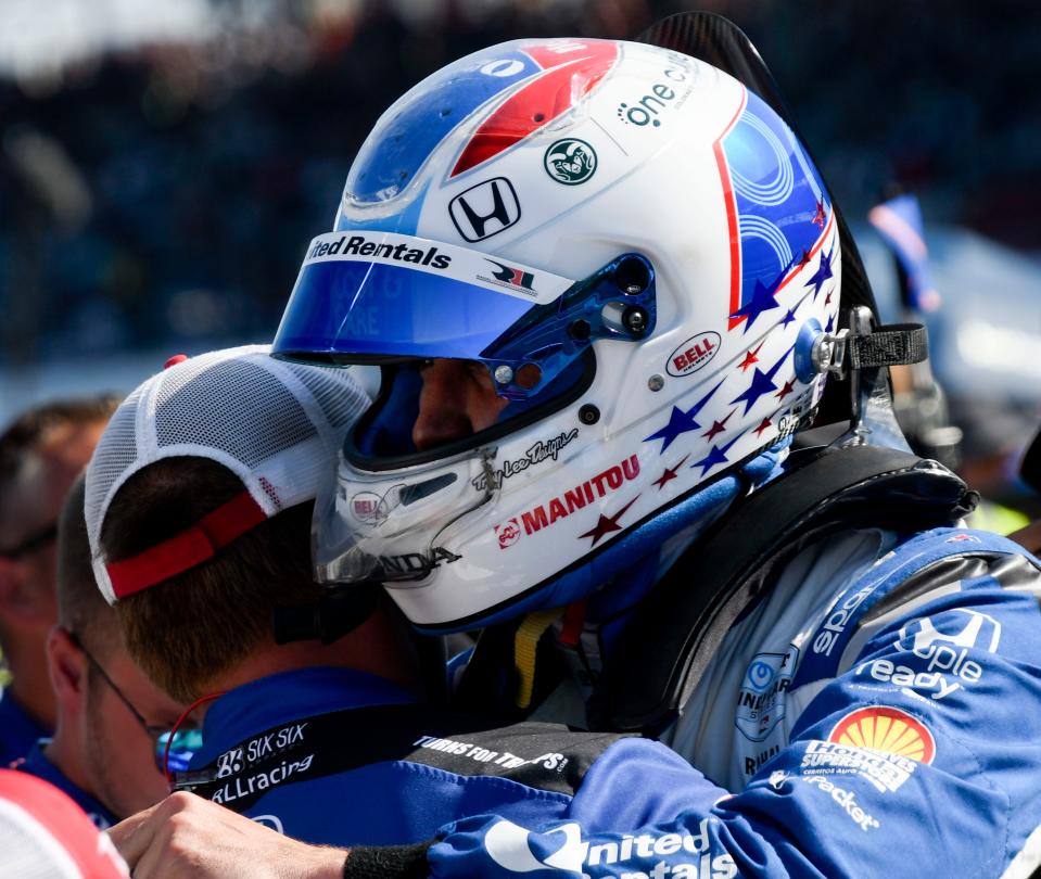 Rahal Letterman Lanigan Racing driver Graham Rahal (15) hugs his teammates after getting bumped from the race by teammate Rahal Letterman Lanigan Racing driver Jack Harvey (30) on Sunday, May 21, 2023, during the second day of qualifying ahead of the 107th running of the Indianapolis 500 at Indianapolis Motor Speedway. 