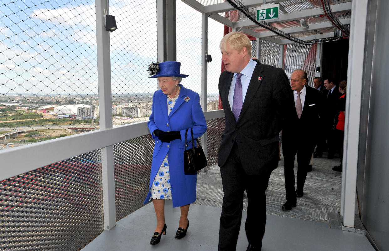 The Queen and Boris Johnson, when he was London Major, during a short tour of the Olympic site in Stratford, in 2012. [Photo: PA]