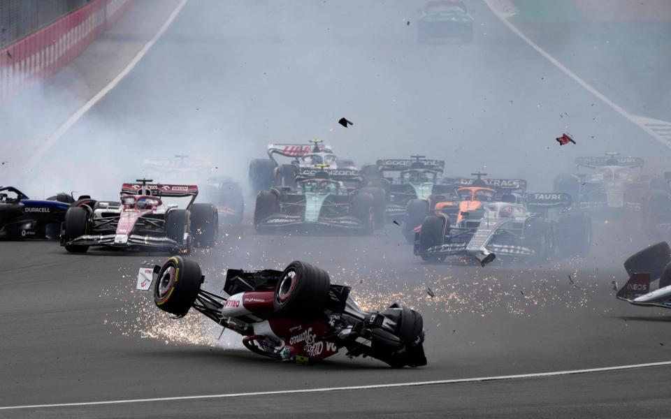 It skids across the track upside down - AP