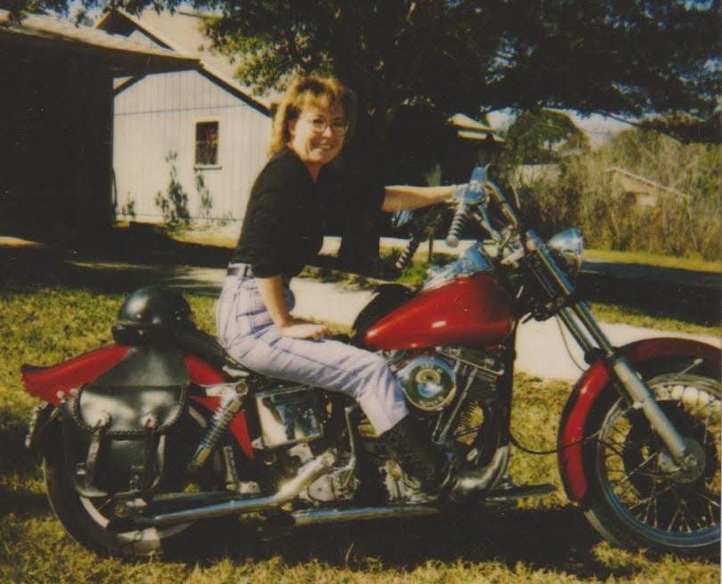 A 38-year-old Dori Ann Myers with her motorcycle. She disappeared in 2006 from her home when she was 43.