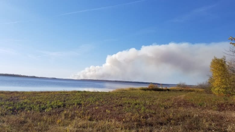 Wildfire burns out of control near Lakeville Corner, unreachable by trucks