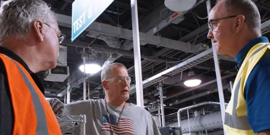 UAW President Shawn Fain talks with workers at GM's Kokomo plant.