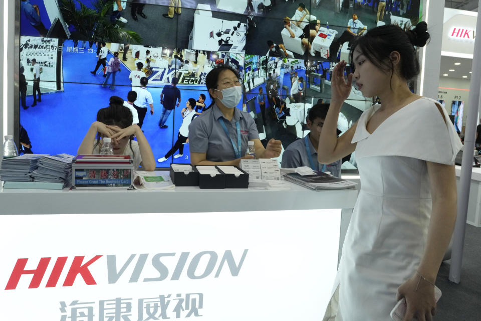 Surveillance camera maker Hikvision, one of the Chinese tech companies sanctioned by the U.S. government for its role in Beijing's crackdown in China's far west Xinjiang region, is seen promoting its technologies during the Security China 2023 in Beijing, on June 7, 2023. After years of breakneck growth, China's security and surveillance industry is now focused on shoring up its vulnerabilities to the United States and other outside actors, worried about risks posed by hackers, advances in artificial intelligence and pressure from rival governments. The renewed emphasis on self-reliance, combating fraud and hardening systems against hacking was on display at the recent Security China exhibition in Beijing. (AP Photo/Ng Han Guan)