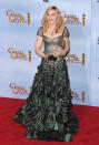The League of Their Own star looked beautiful in this silver and green ruffled ensemble.