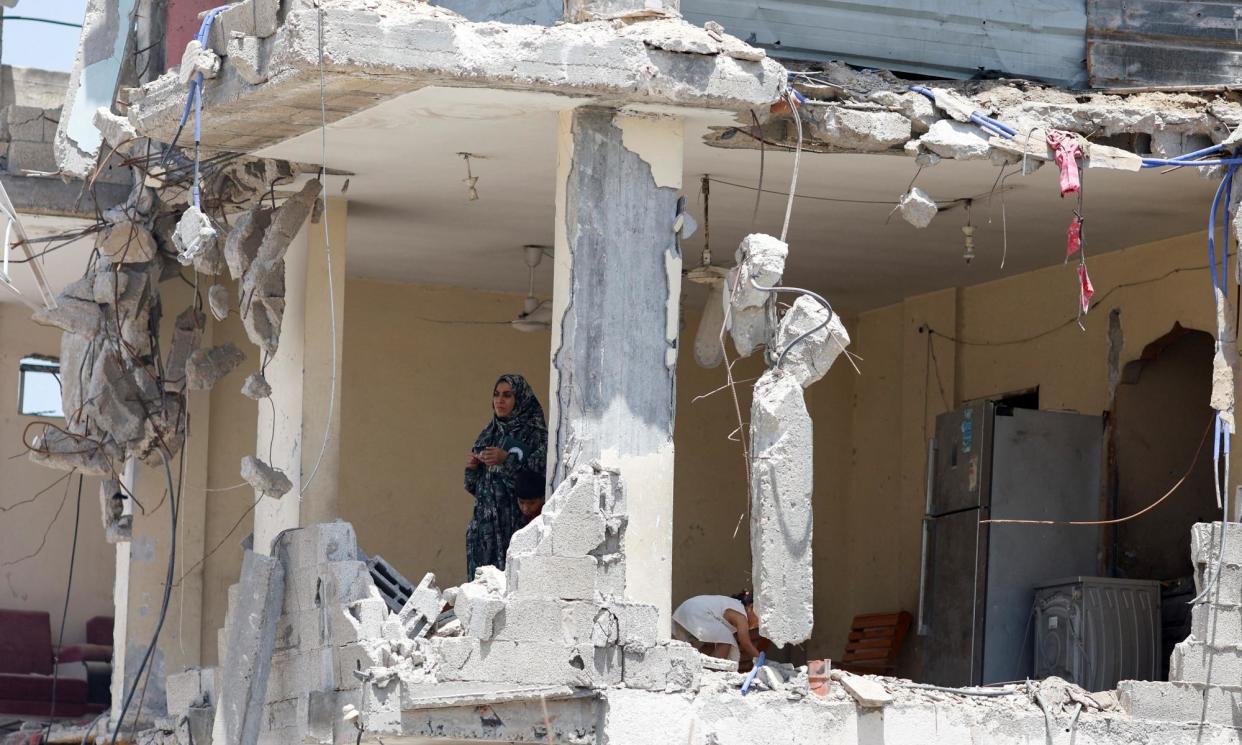 <span>The aftermath of an Israeli strike in Khan Younis in the southern Gaza Strip, 22 May.</span><span>Photograph: Mohammed Salem/Reuters</span>