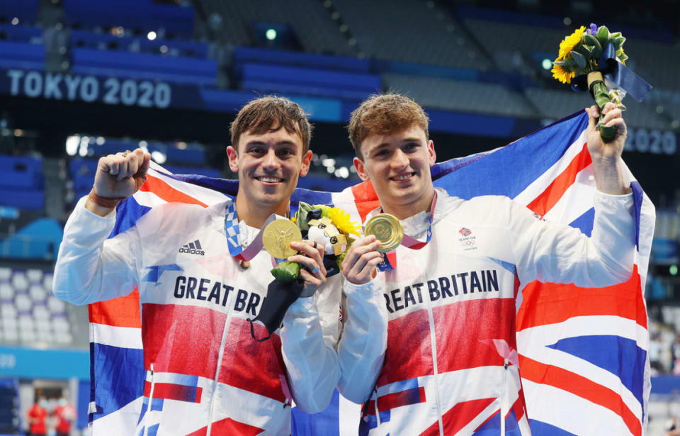 <div class="inline-image__caption"> <p>Tom Daley and Matty Lee of Team Great Britain pose for photographers with their gold medals after winning the Men’s Synchronized 10m Platform Final on July 26, 2021, in Tokyo.</p> </div> <div class="inline-image__credit"> Clive Rose/Getty </div>