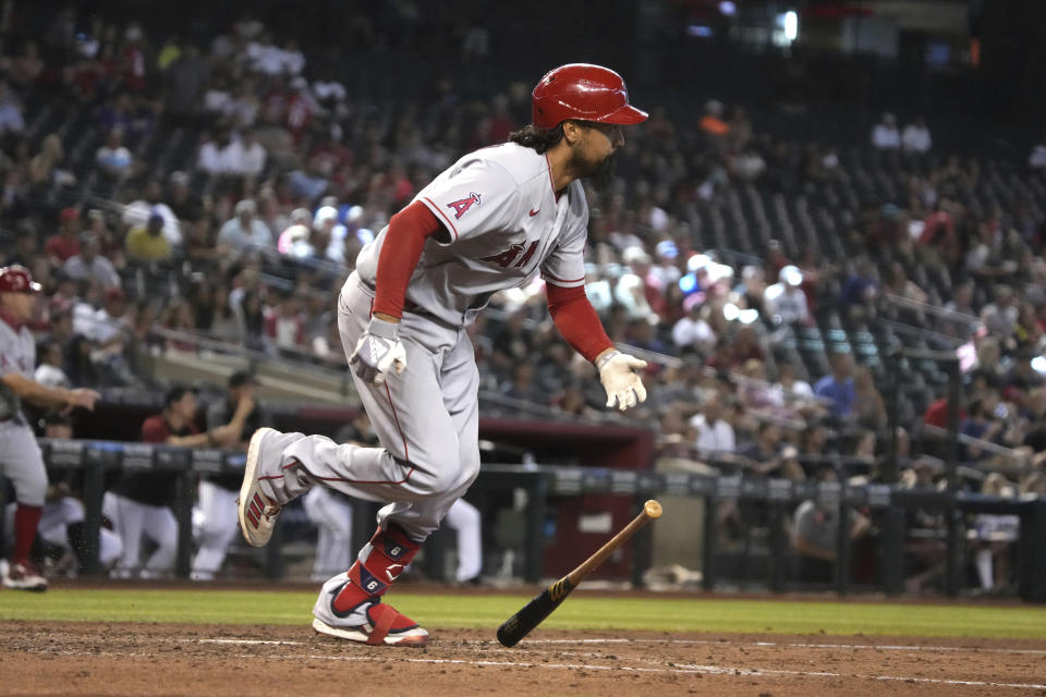 Los Angeles Angels' Anthony Rendon hits a two-run double against the Arizona Diamondbacks in the fifth inning during a baseball game, Saturday, June 12, 2021, in Phoenix. (AP Photo/Rick Scuteri)