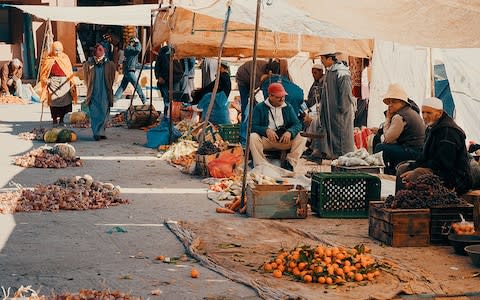 Market in the Atlas Mountains - Credit: Caroline Darcourt